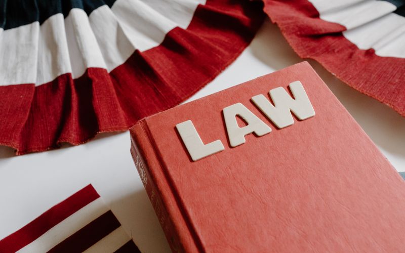Red law book on a desk